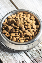 Dried kibble pet food. Heart shape dried animal food.
