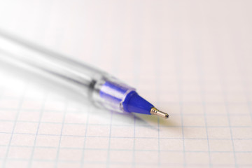 image of a pen on a notebook sheet