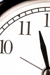 Obraz na płótnie Canvas The image of a clock close up