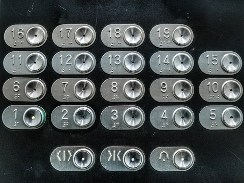 the image of an elevator buttons