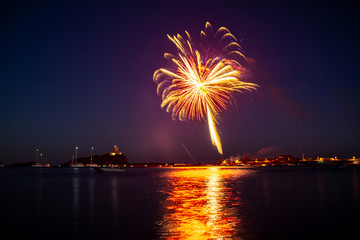 Fireworks over the sea of Nora bay, Sardinia
