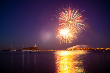 Fireworks over the sea of Nora bay, Sardinia