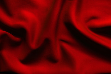 Red  luxury cloth background. Satin velvet material or luxurious.