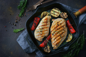 chicken fillet with grilled vegetables in a pan