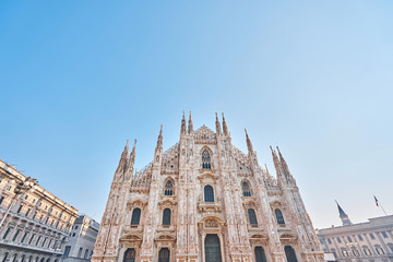 Fototapeta premium Milan Cathedral on sunny day, Italy. Milan Cathedral or Duomo di Milano is top tourist attraction of Milan.