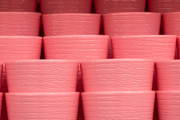 Porcelain flower pots in pink color. Photographed inside the store.
