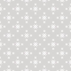 Fototapeta premium Vector ornamental seamless pattern with cross shapes, stars. Abstract geometric texture in soft pastel colors, white and beige. Subtle vintage background. Repeat design for prints, fabric, textile
