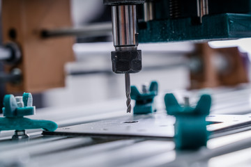 CNC milling machine cutting aluminium  part.