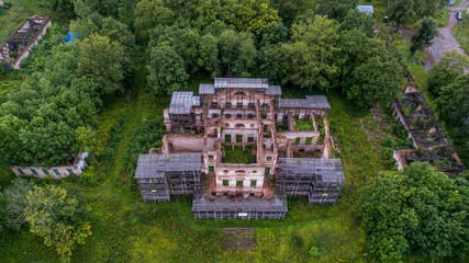 The ruins of the Palace in the manor Gostilitsy, Leningrad region Architect A. I. Stackenschneider. 
World Heritage in decline. Signboard with the inscription - Emergency condition.