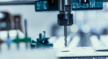 CNC milling machine cutting aluminium  part.