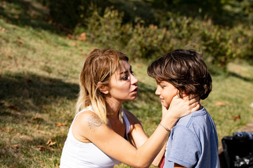 Obraz premium Beautiful Mother Looking Her Son