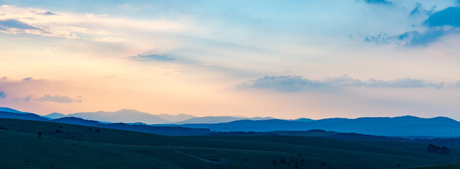 landscape with mountains and clouds