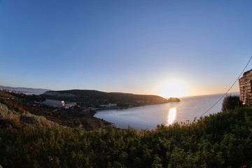 Sunup on calamosca beach from capo sant'Elia lighthouse