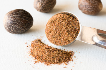 Ground Nutmeg Spilled from a Teaspoon
