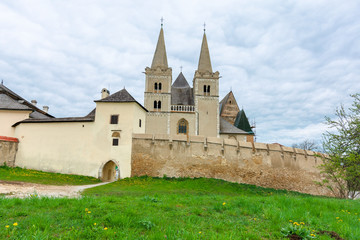 Fototapeta na wymiar spisska kapitula, slovakia - APR 29, 2019: st. martin's cathedral in spring. One of the largest Romanesque and Gothic styles architecture monuments build between 13 and 15 century in eastern slovakia