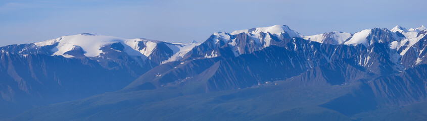 Snowy mountain range, panorama landscape, morning light