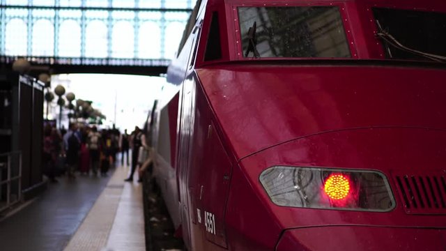 Passengers getting on Thalys high-speed train. Gare du Nord railway station in Paris. Europe summer travel. France tourism. 