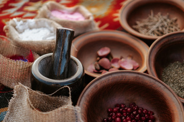 Berries, herbs, and other ingredients for making a magic potion. Close up