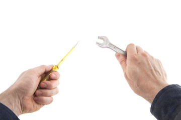 The repairman's hands hold the working tool and are ready to perform the diagnostic and repair work. Symbolic image of a repair shop in isolation on a white background.