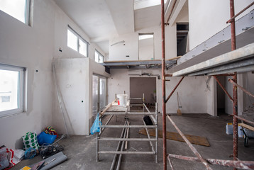 interior of construction site with scaffolding