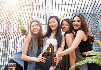 young asian woman happy  party drink beer.