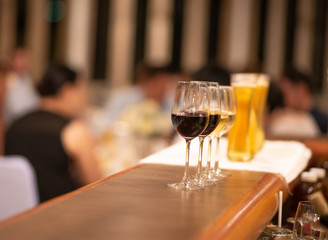 cold beer glass on bar counter with free space