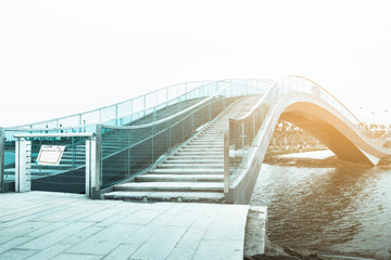 modern bridge with glass handrail