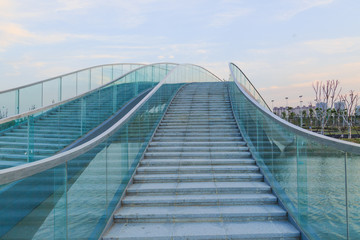 modern bridge with glass handrail