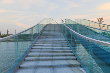 modern bridge with glass handrail