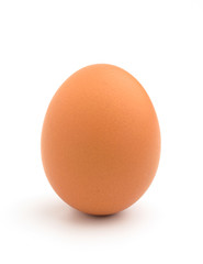 Single raw chicken egg isolated on the white background.