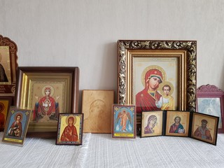 Vintage orthodox icons on a shelf