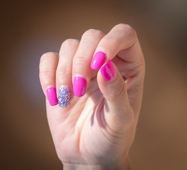 Red manicure on the nails