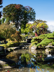 Traditional Japanese public garden near reconstructed Takashima castle in Suwa, Nagano prefecture, Japan
