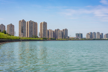 skyline of big city with water at mianyang china