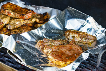 Meat grilling on grill