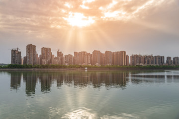 skyline of big city with water at mianyang china