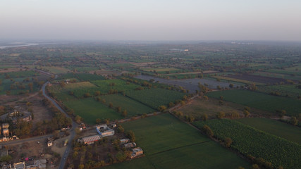Aerial view of Indian agricultural fields and village 