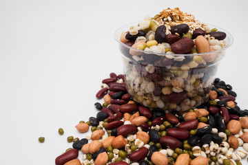 Mix of beans in a transparent cup, Zoom macro.