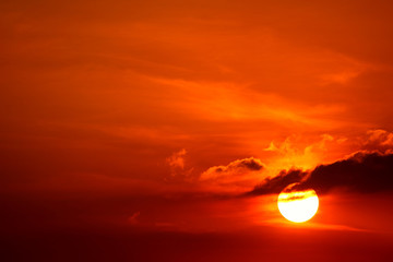 sunset on red sky and sun ray back silhouette evening cloud