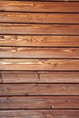 Obraz premium Close up shot of brown wooden wall with texture for Backgrounds, Wallpaper, Pattern.