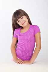 Obraz premium Beautiful smiling girl isolated over white