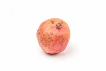 dried pomegranate fruit on a white background