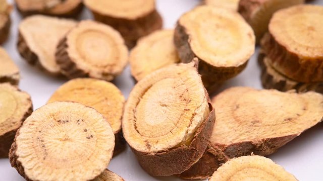 side view herb medicine GanCao or Glycyrrhizae Radix et Rhizoma or Liquorice Root rotate and pause
