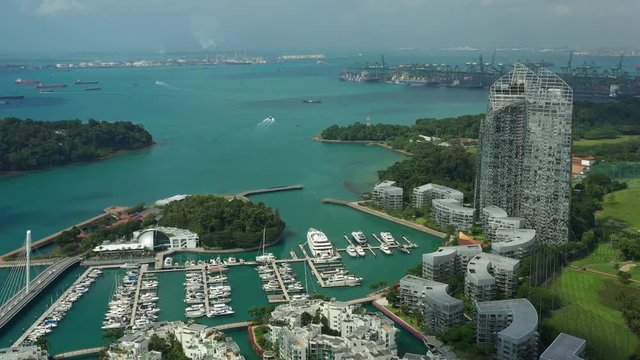 singapore city sunny day apartment bay complex yacht dock marina traffic road aerial panorama 4k 