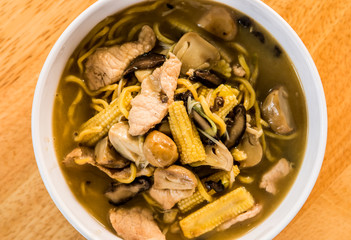 Yellow noodles  in  bowl , Thai or Chinese food