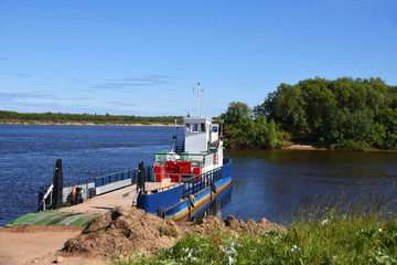 Old barge for crossing cars and people between the islands