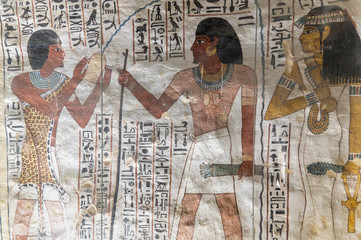 Ancient Egyptian wall drawings from the tomb of Sennofer in the nobles tombs at Luxor Egypt.