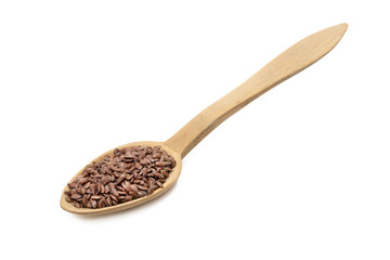 Linseed or flax seeds on a wood spoon seen obliquely from front and isolated on white background