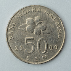 2009 Malaysia coin  50 sen isolated on white background front view © Lee