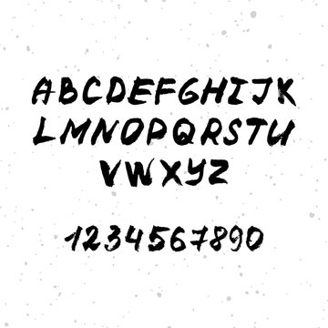 Vector hand drawn brush font. Black ink alphabet with numbers
